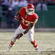 Larry Johnson in 2006, when he carried the ball an NFL-record 416 times. Photo: Dilip Vishwanat/Getty Images